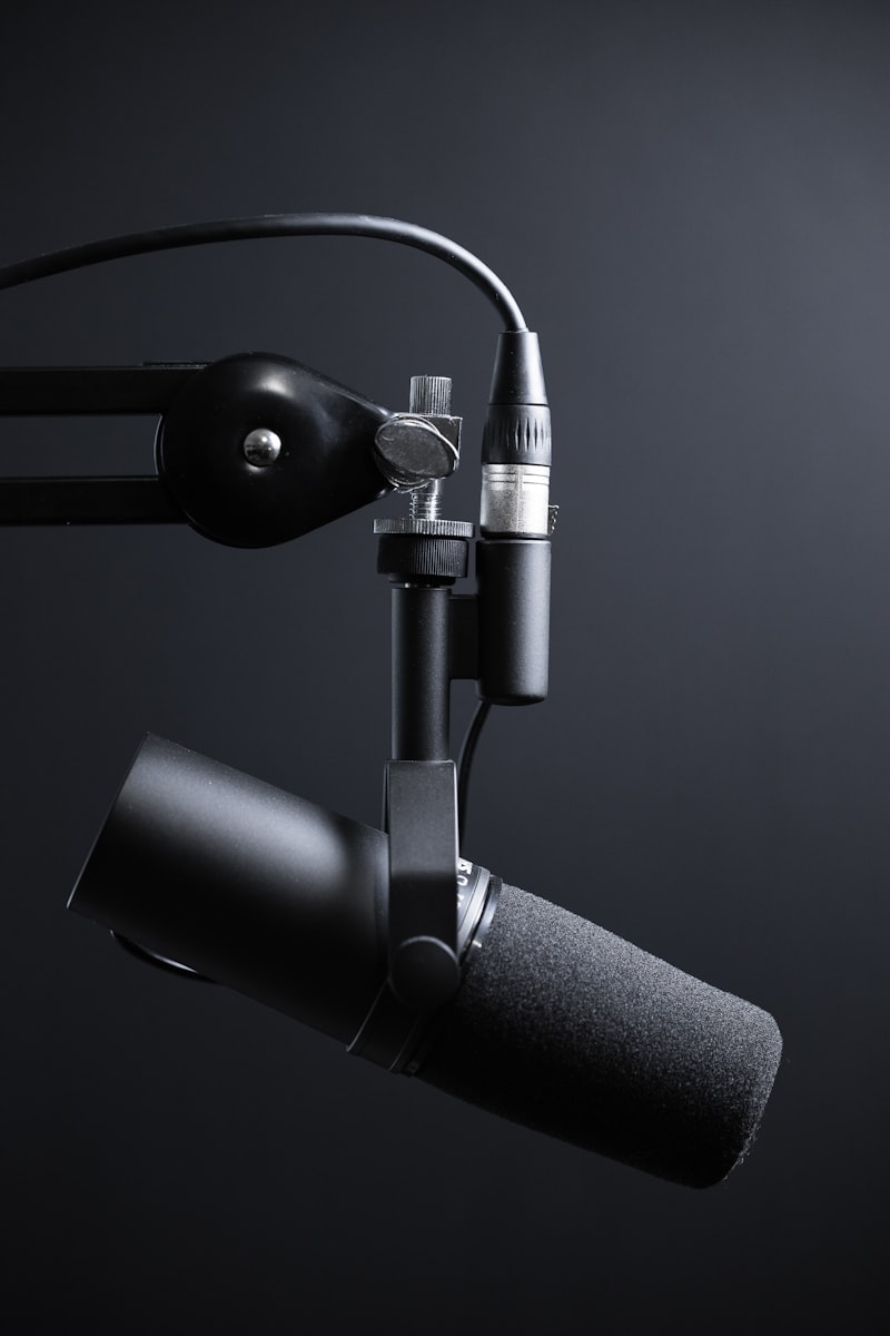 Professional podcast setup with high-quality microphones and clear headphones